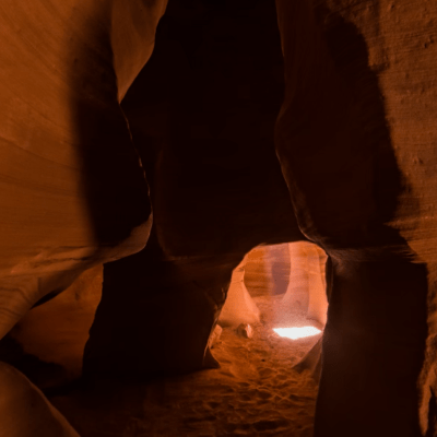 a person sitting in a dark room