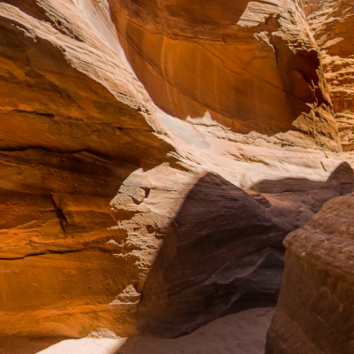 a canyon with a mountain in the background