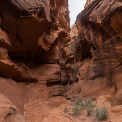 a canyon with a large rock