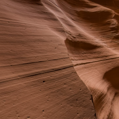a person walking in the sand